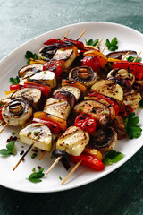 juicy vegetarian barbecue kebabs made from delicious fresh vegetables. vegan grill party