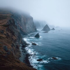 Coastal cliffs under a misty sky