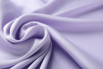 Crumpled violet silk fabric as background, closeup