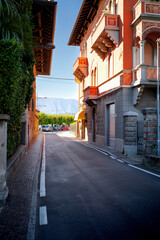 Fototapeta premium Narrow streets and colorful houses. Italy, Menaggio, Lake Como. 