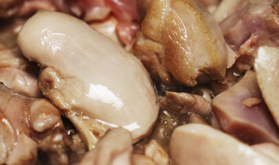 Frying Chicken Thighs in Oil for Pilaf.