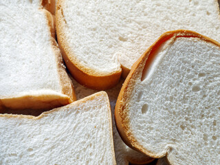 Close-up of freshly sliced ​​soft and fragrant bread with white bread,brown bread crust macro