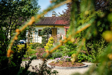 A very beautiful garden house in a neat and tidy allotment in summer. Gardening, allotments, urban gardening