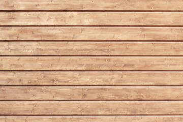 the wall is made of a wooden beam with a chamfer