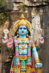 Majestic Four-Armed Vishnu Statue with Divine Attributes – Hindu God Sculpture.