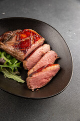 Duck breast roast meat poultry fresh delicious gourmet food background on the table rustic food top view copy space