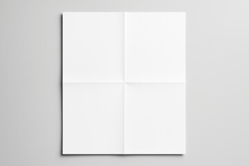 Blank folded paper mockup on light background for design, branding, or advertising concept with clean copy space and minimal layout.