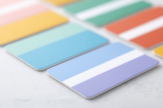 collection of digital coupon and discount cards scattered across white surface each in clean simplified design with