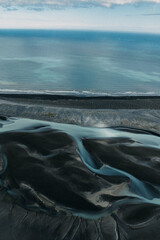 Aerial view of Fjorur beach with glacial rivers in East Iceland...
