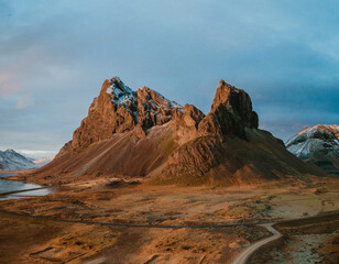 Golden hour light on Eystrahorn mountain in East Iceland&rsquo;s dramatic landscape...