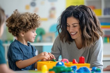 Speech therapist helps child with autism in classroom setting
