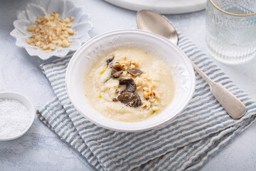 Vegetarian cauliflower soup with truffle and macademia nuts