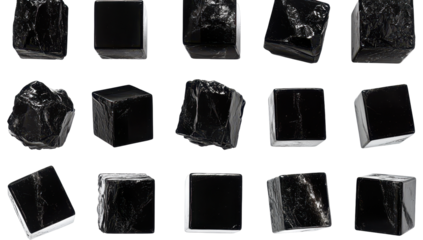 A grid of black marble cubes, some showing veining and imperfect, irregular shapes, against a black background