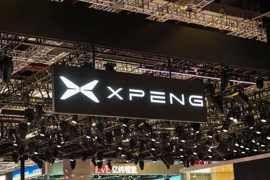 Xpeng. Enthusiastic attendees explore various displays at the Shanghai auto show, admiring innovative designs and technology. China, Shanghai, may 2, 2025