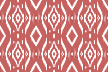 Seamless ikat background in terracotta tone with ethnic flair. Ideal for digital designs, packaging, or boho projects.
