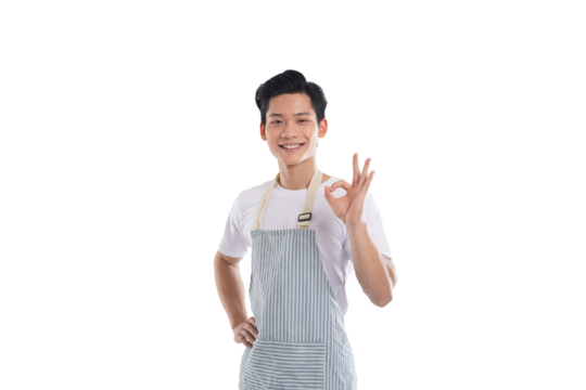 portrait of asian man wearing apron posing on white background