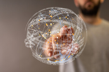 Abstract image of a person interacting with a digital sphere filled with data points and code.