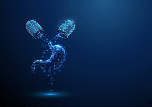 Opened blue medical drug capsule with falling particles on stomach. Healthcare medical pharmacy, gastric disease, therapy, digestive health concept.
