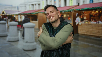 Happy man embracing moment in vibrant urban market surrounded by lively street activities and...