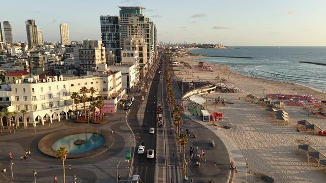Tel Aviv Coastline Road by the ocean from above during sunset
