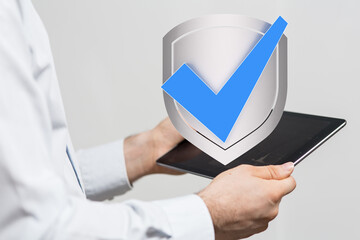 Cybersecurity concept. Approved data protection on digital tablet.