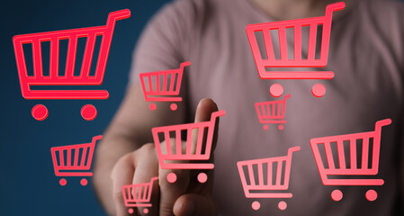 Person interacts with digital shopping carts, e-commerce concept.