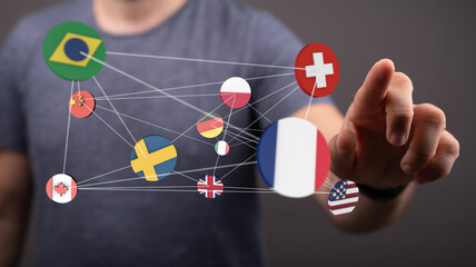 Image of interconnected flags representing global business, networking, and international...