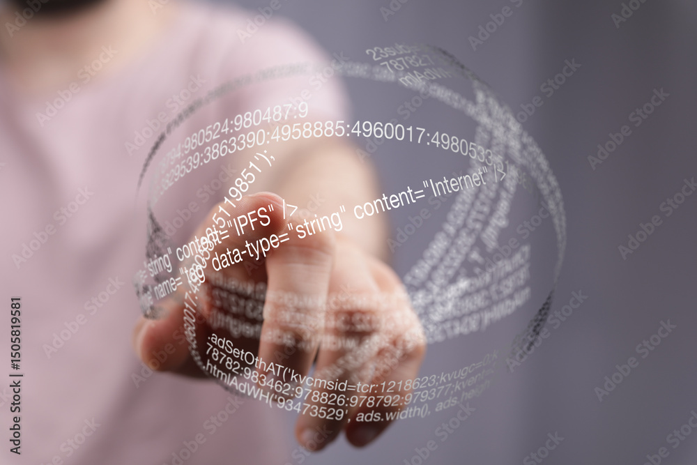 Aufkleber Close-up of a hand interacting with a 3D holographic display of code, showcasing digital technology.