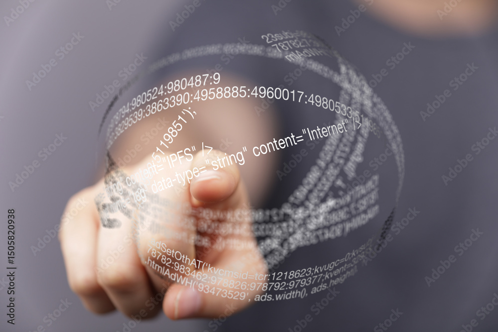 Poster hand pointing at a futuristic holographic display showing data streams and code.