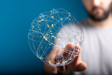 Abstract image of a person interacting with a digital global network. Represents connection,...