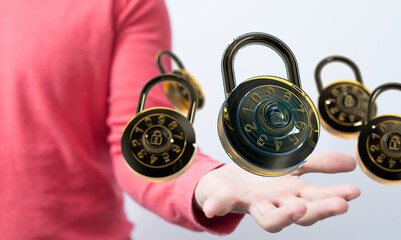 Image of combination locks floating on a hand, representing data security and protection.