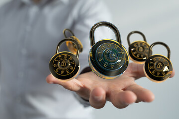 Image of multiple combination locks hovering above a hand, symbolizing data security and protection.