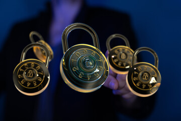 Cybersecurity concept.  Gold combination locks illustrate data protection and online safety.