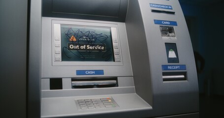 Unrecognizable Person Marking ATM Screen with Graffiti with Marker. Vandal Causing Property Damage,...