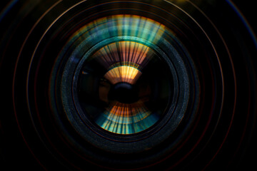 Close-up camera lens,Photo Camera or Video lens close-up on black background, objective, concept of photographer camera man job, looking for a photographer,