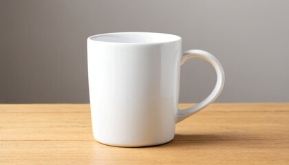 Fototapeta premium Elegant white ceramic mug on a light brown wooden table offers a minimalist aesthetic perfect for showcasing designs or enjoying your favorite beverage in a peaceful setting