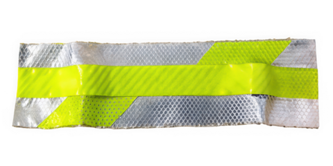 A reflective safety strip featuring neon yellow and silver colors, designed for high visibility in low light conditions, highlighting safety in construction or outdoor settings.