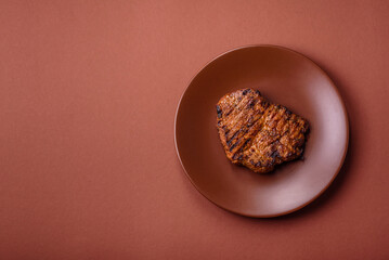 Meat, steak, beef tenderloin cooked on grill. Juicy steak as a food background