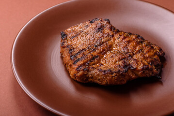 Meat, steak, beef tenderloin cooked on grill. Juicy steak as a food background