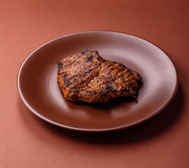 Meat, steak, beef tenderloin cooked on grill. Juicy steak as a food background