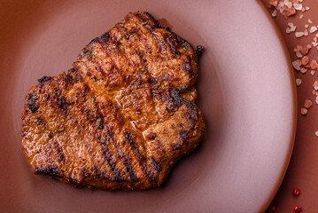 Meat, steak, beef tenderloin cooked on grill. Juicy steak as a food background