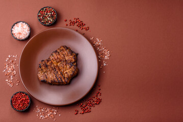 Meat, steak, beef tenderloin cooked on grill. Juicy steak as a food background