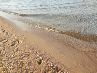 gentle coastal waves on the seashore