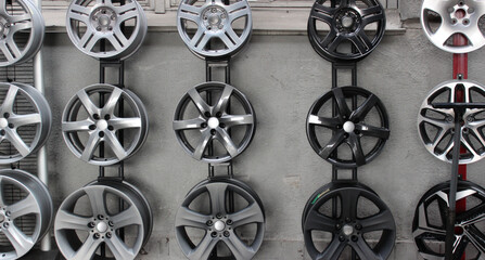 Various Design of New Wheel Discs The Shelf in Car Parts Store
