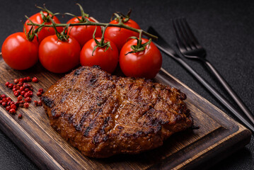 Meat, steak, beef tenderloin cooked on grill. Juicy steak as a food background