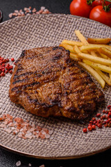 Meat, steak, beef tenderloin cooked on grill. Juicy steak as a food background
