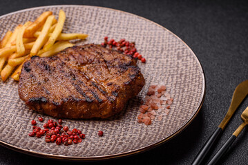 Meat, steak, beef tenderloin cooked on grill. Juicy steak as a food background