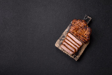 Meat, steak, beef tenderloin cooked on grill. Juicy steak as a food background