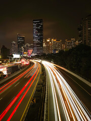 Fototapeta premium Night view of jakarta city downtown illuminated street traffic with skyscrapers. Jakarta city street