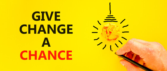 Give change a chance symbol. Concept words phrase Give change a chance on beautiful yellow paper....